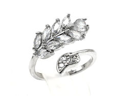 Кольцо веточка 18*15мм цв.хрусталь Радуга камня