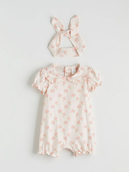 ?i?ekli K?z Bebek Tulum ve Sa? Band?