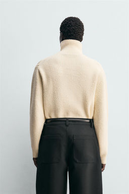 STRUCTURED HIGH NECK JUMPER