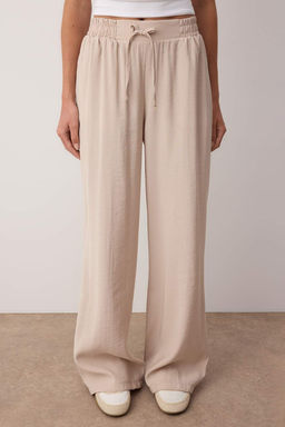 Indigo Modal Kumas Beli Lastikli Wide Leg/Genis Paca Pantolon TWOSS25PL00130 - Trendyolmilla фото 7