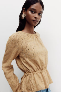 Top en punto pointelle con peplum - H&m фото 4