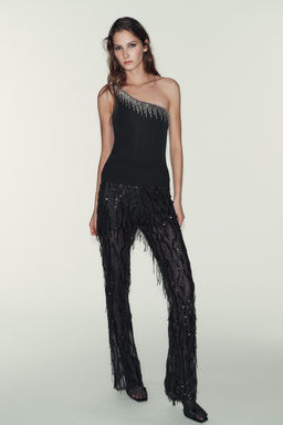 ASYMMETRIC FRINGED SHIMMER BODYSUIT