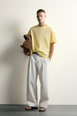 CAMISETA RELAXED FIT GR?FICO SOL / Mantequilla