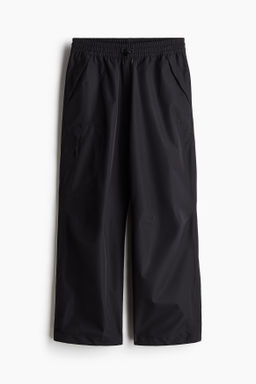 Pantal?n chubasquero unisex con StormMove