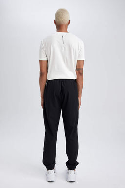 DeFactoFit Облегающие тканые спортивные штаны для бега с двумя карманами  фото 6