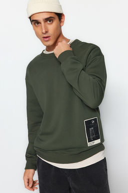 TRENDYOL MAN Siyah Oversize/Genis Kesim Bisiklet Yaka Sanat Tema Aplikeli Ici Polarl? Sweatshirt TMNAW24SW00038