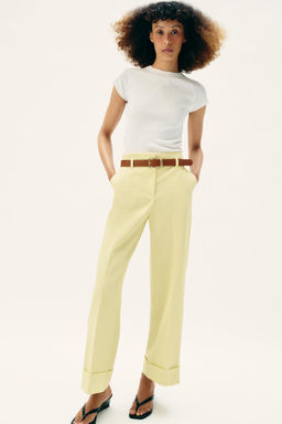 TROUSERS WITH TURN-UP CUFFS AND BELT