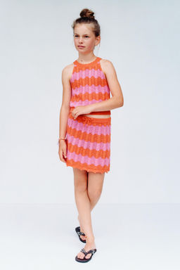 FALDA PUNTO CROCHET RAYAS / Naranja fl?or