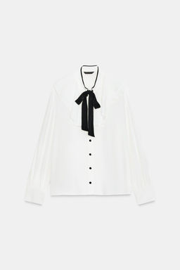 RUFFLED BLOUSE WITH CONTRAST BOW