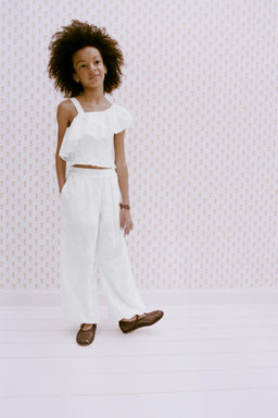 TOP VOLANTE ASIM?TRICO / Blanco