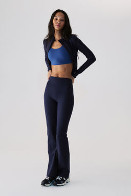 Leggings de yoga acampanados con SoftMove - H&m фото 12