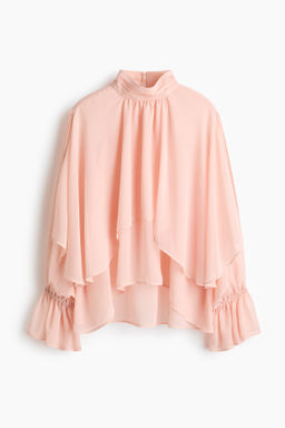 Blusa de volantes con detalle efecto capa