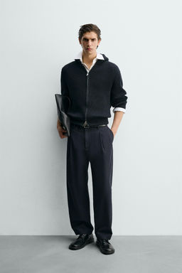 PLEATED RELAXED FIT TROUSERS
