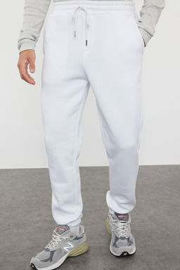 TRENDYOL MAN Siyah Un?sex Regular/Normal Kesim Pacas? Lastikli Ici Polar/S?cak Tutan Esofman Alt? TMNAW22EA0346