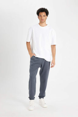 Мужские спортивные штаны обычного кроя антрацитового цвета с карманами и эластичными штанинами - Defacto фото 2