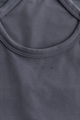 Top de deporte SoftMove con sujetador integrado - H&m фото 9