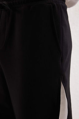 TRENDYOL MAN Siyah Un?sex Oversize/Genis Kesim Tas Panel Detayl? Esofman Alt? TMNSS25EA00004 - Trendyolmilla фото 4