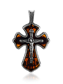 Нательный крестик среднего размера из полупрозрачного янтаря коньячного цвета в изящном обрамлении