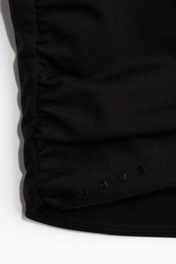 Top de tirantes SoftMove con detalle girado - H&m фото 7