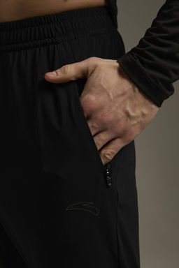 Брюки трикотажные укороченные Черный ADVANCED RUNNING Knit Ankle Pants - Anta фото 5