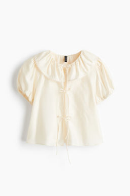 Blusa con lazadas