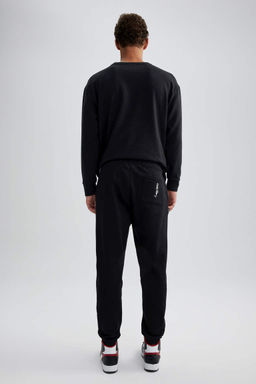 Спортивные брюки с карманами Keith Haring стандартного кроя - Defacto фото 8