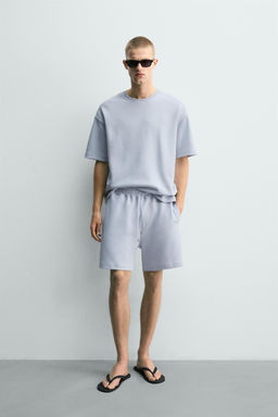 BERMUDA JOGGER RELAXED FIT INTERLOCK / Celeste