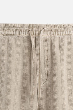 RELAXED FIT JACQUARD TROUSERS - Zara фото 29