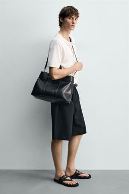 BOLSO DE MANO CINTUR?N / Negro