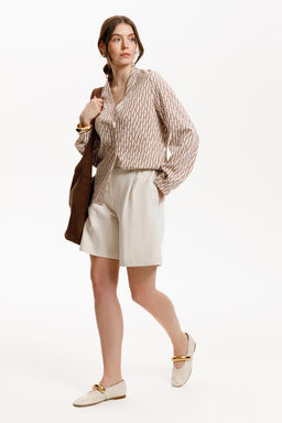 ЕВТ 3284/бежевые мини косы жакет жен