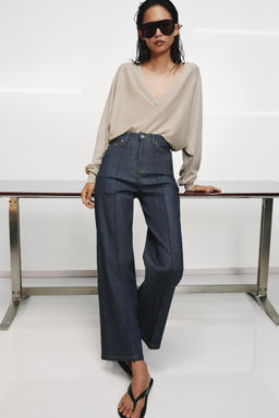 JERSEY CON LANA ESCOTE PICO / Arena / Vigor?