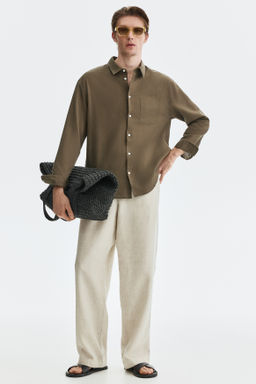 Camisa en mezcla de lino Relaxed Fit - H&m фото 13