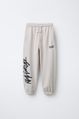GRAFFITI PRINT JOGGER TROUSERS