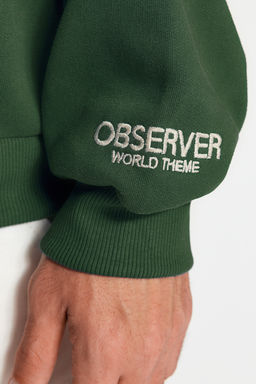 TRENDYOL MAN Siyah Kapusonlu Oversize/Genis Kesim Nak?sl? Etiketli Yumusak Kumas Sweatshirt TMNAW24SW00031 - Trendyolmilla фото 35