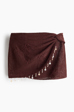 Falda playera de algod?n con detalles bordados