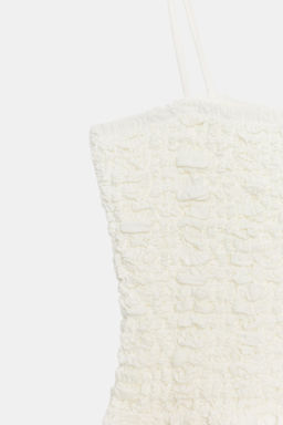 TOP NIDO DE ABEJA PEPLUM / Blanco