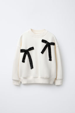 BOW AND SEQUIN SWEATSHIRT